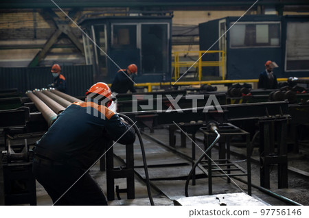 Worker at Steel Factory or Pipe Mill located in Taganrog South of Russia 97756146
