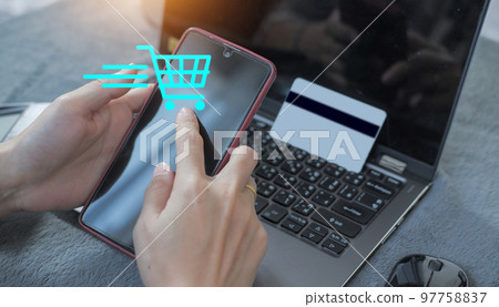credit card filling in billing information in purchase of laptop computer in ecommerce store. Concept: online payment. Internet accessible money transactions credit card filling in billing information in purchase of laptop computer in ecommerce store. Concept: online payment. Internet accessible money transactions 97758837