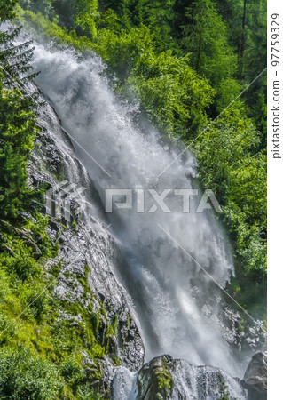Image of high waterfall during the day Image of high waterfall during the day 97759329