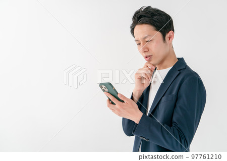 Smartphone thinking man 97761210