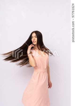 Young woman with long hair. Brunette Young woman with long hair. Brunette 97761824
