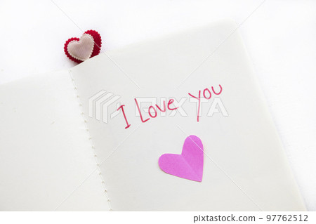 i love you message handwriting on notebook with hearts i love you message handwriting on notebook with hearts 97762512