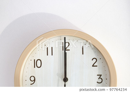 wall clock showing 12 noon 97764234