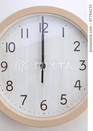 wall clock showing 12 noon 97764235