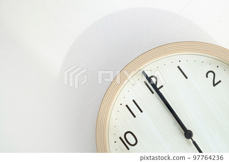wall clock showing 12 noon 97764236
