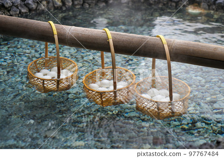 Onsen eggs in hot springs Onsen eggs in hot springs 97767484