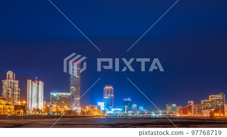 Yekaterinburg city with Buildings of Regional Government and Parliament, Dramatic Theatre, Iset Tower, Yeltsin Center, panoramic view at Early Spring night Yekaterinburg city with Buildings of Regional Government and Parliament, Dramatic Theatre, Iset Tower, Yeltsin Center, panoramic view at Early Spring night 97768719
