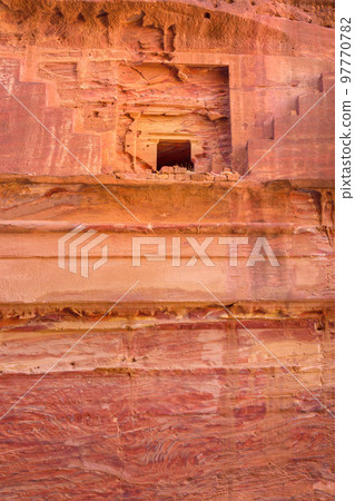 Carved walls in the ancient Petra City, Jordan Carved walls in the ancient Petra City, Jordan 97770782
