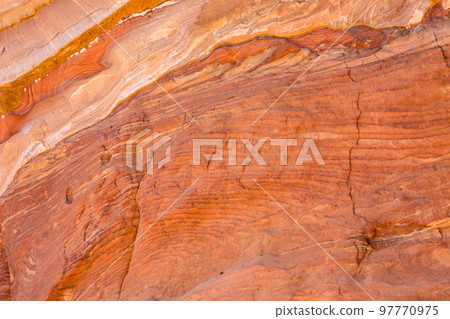 Sandstone rock and mineral layers in Petra, Jordan Sandstone rock and mineral layers in Petra, Jordan 97770975