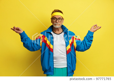 Meditation. Senior Man Relaxing and Doing Yoga Gesture 97771765