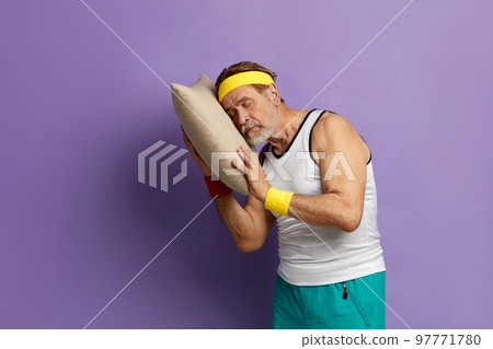 Senior Man Sleeping Pillow. Portrait Of Grandfather Holding In Hands Pillow 97771780