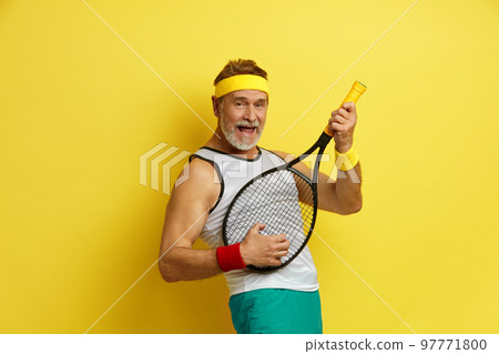 Play Tennis. Smiling Man Holding Tennis Rocket. Funny Senior Tennis Player Playing At Rocket Play Tennis. Smiling Man Holding Tennis Rocket. Funny Senior Tennis Player Playing At Rocket 97771800