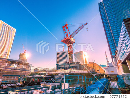 The cityscape of Tokyo in Japan, overlooking the black Yamanote Line and Hamamatsucho Station The cityscape of Tokyo in Japan, overlooking the black Yamanote Line and Hamamatsucho Station 97771852