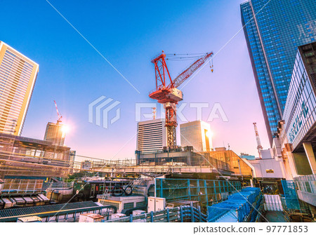 The cityscape of Tokyo in Japan, overlooking the black Yamanote Line and Hamamatsucho Station The cityscape of Tokyo in Japan, overlooking the black Yamanote Line and Hamamatsucho Station 97771853