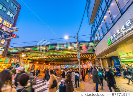Tokyo cityscape in Japan View of Shin-Okubo station and the black Yamanote line that departed from the station Tokyo cityscape in Japan View of Shin-Okubo station and the black Yamanote line that departed from the station 97771924