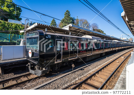 Tokyo cityscape in Japan Black Yamanote Line (rear vehicle) arriving at Nishi-Nippori Station 97772211