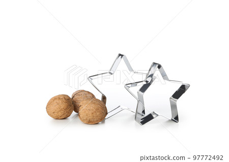 Concept of cooking tools, cookie cutters, isolated on white background 97772492