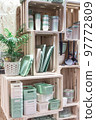 Organization of storage and home space in a loft style. Storage boxes on shelves 97772809