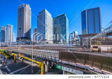 Tokyo cityscape in Japan View of Shinkansen and skyscrapers from in front of Hamamatsucho Station (North Exit) 97772828
