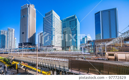 Tokyo cityscape in Japan View of Shinkansen and skyscrapers from in front of Hamamatsucho Station (North Exit) Tokyo cityscape in Japan View of Shinkansen and skyscrapers from in front of Hamamatsucho Station (North Exit) 97772829