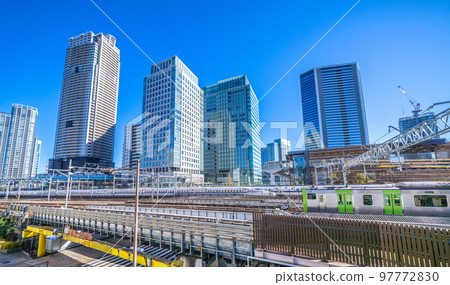 Tokyo cityscape in Japan View of Shinkansen and skyscrapers from in front of Hamamatsucho Station (North Exit) 97772830