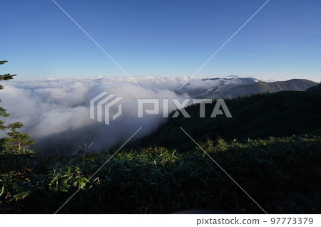 Mount Kusatsu-Shirane, Gunma Prefecture National Route 292 Sea of Clouds seen from Shiga Kusatsu Kogen Road near Shibutoge September 16, 2022 Mount Kusatsu-Shirane, Gunma Prefecture National Route 292 Sea of Clouds seen from Shiga Kusatsu Kogen Road near Shibutoge September 16, 2022 97773379