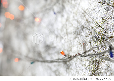 Minimal Christmas light bulb wires with cold winter white abstract background 97773600