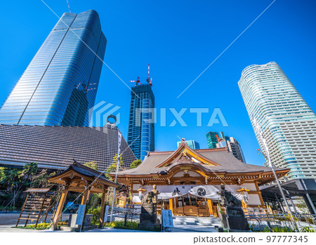 View of Tokyo cityscape of Japan, Hachiman Shrine (reconstruction) and skyscrapers of Toranomon / Azabudai project View of Tokyo cityscape of Japan, Hachiman Shrine (reconstruction) and skyscrapers of Toranomon / Azabudai project 97777345