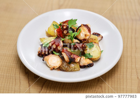 Stir-fried octopus and potatoes 97777983