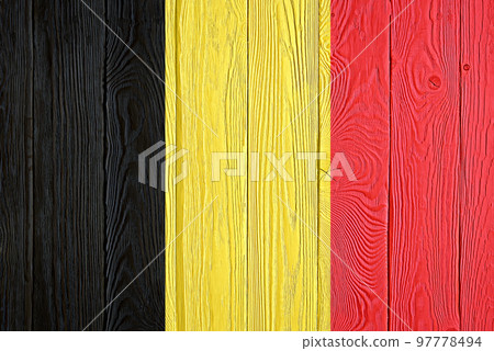 Belgium flag painted on old wood plank background. Brushed natural light knotted wooden board texture. Wooden texture background flag of Belgium. Belgium flag painted on old wood plank background. Brushed natural light knotted wooden board texture. Wooden texture background flag of Belgium. 97778494