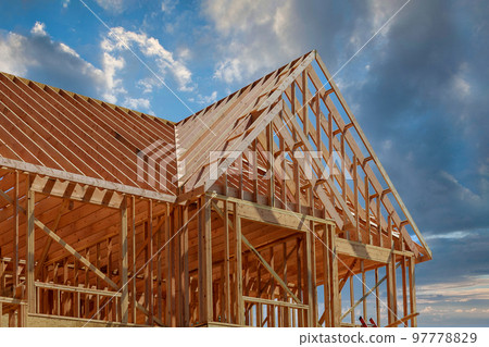During construction of new stick home wooden roof beam was constructed from an adjacent framework frame made from trusses. 97778829