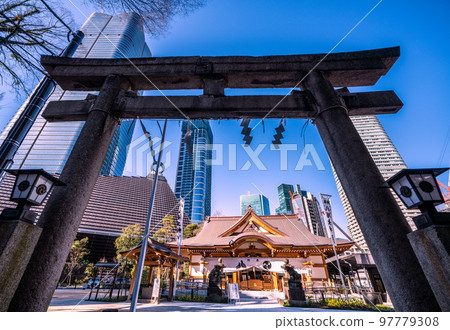 The cityscape of Tokyo in Japan, with views of the skyscrapers of the Toranomon-Azabudai project and Hachiman Shrine The cityscape of Tokyo in Japan, with views of the skyscrapers of the Toranomon-Azabudai project and Hachiman Shrine 97779308