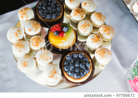 Delicious wedding reception candy bar dessert table 97780672