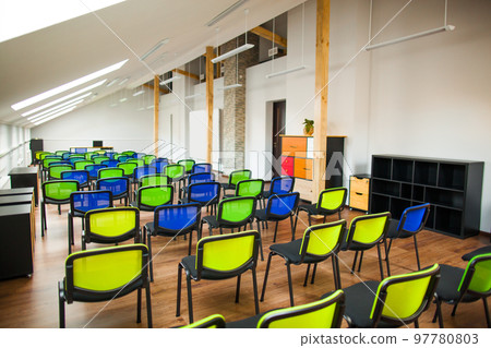 modern lecture room with with colored chairs and interesting design modern lecture room with with colored chairs and interesting design 97780803