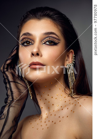 beauty bright eye makeup with arrows with rhinestones 97780978
