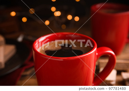 Cup of delicious black coffee on table, closeup 97781480