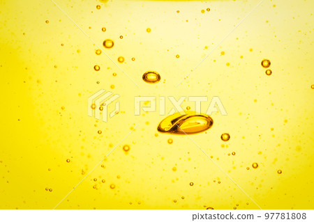 Cooking oil with bubbles as background, closeup 97781808