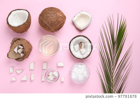 Flat lay composition with coconut oil on pink background Flat lay composition with coconut oil on pink background 97781878