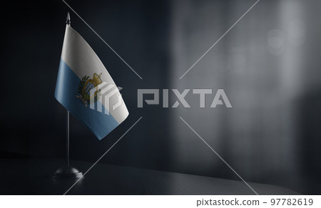 Small national flag of the San Marino on a black background Small national flag of the San Marino on a black background 97782619