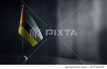 Small national flag of the Mozambique on a black background Small national flag of the Mozambique on a black background 97782660