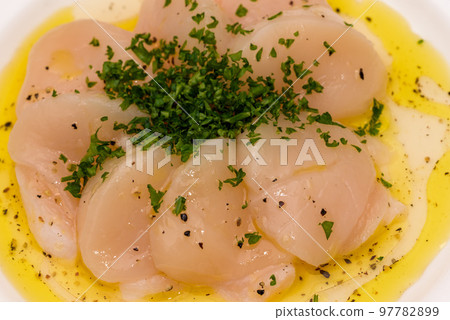 Scallop carpaccio 97782899