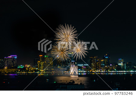 Abstract colored firework background light up the sky with dazzling display 97783246