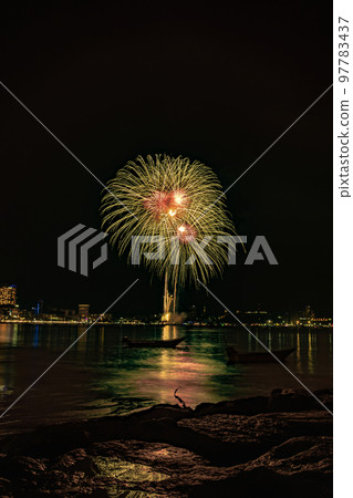 Abstract colored firework background light up the sky with dazzling display Abstract colored firework background light up the sky with dazzling display 97783437