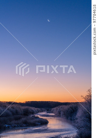 Crescent moon and Blue Moment of Settsuri River seen from Otowa Bridge, red-crowned cranes Crescent moon and Blue Moment of Settsuri River seen from Otowa Bridge, red-crowned cranes 97784618