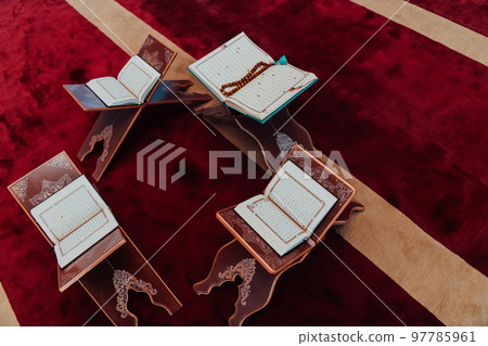 Photo of the holy Islamic book of the Qoran in a modern mosque 97785961