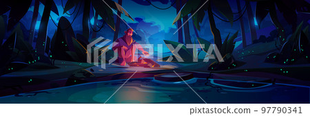 Alone lost man with campfire in jungle at night 97790341