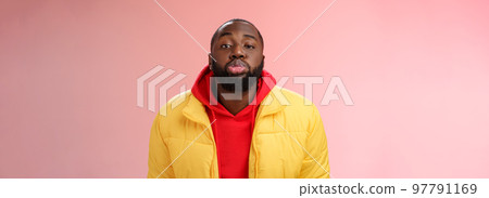 Portrait bored childish cute african bearded 25s male show tongue grimacing making funny faces immature behaviour unwilling grow-up standing pink background mimicking folding lips tube Portrait bored childish cute african bearded 25s male show tongue grimacing making funny faces immature behaviour unwilling grow-up standing pink background mimicking folding lips tube 97791169