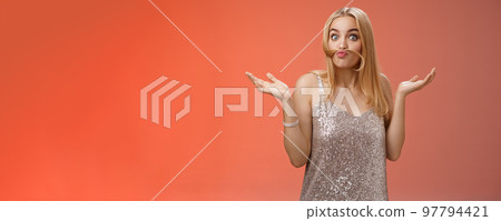 Who told I adult. Playful carefree funny charming blond woman make moustache from hair strand mimicking old man shrugging hands sideways questioned fool around playing red background Who told I adult. Playful carefree funny charming blond woman make moustache from hair strand mimicking old man shrugging hands sideways questioned fool around playing red background 97794421