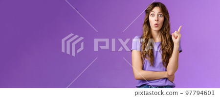Got it eureka. Excited enthusiastic creative cute european girl raise index finger folding lips wow great found solution suggest perfect plan stand purple background thrilled give good advice Got it eureka. Excited enthusiastic creative cute european girl raise index finger folding lips wow great found solution suggest perfect plan stand purple background thrilled give good advice 97794601