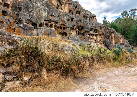 Ventanillas de Otuzco Peruvian archaeological site, cemetery in the rock 97794997